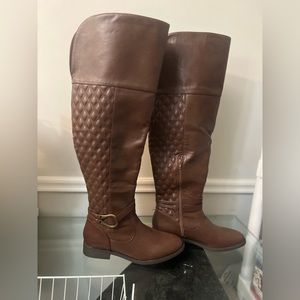 brown high boots. It does not have any brand name